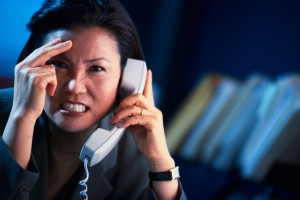 Frustrated Businesswoman on the Phone
